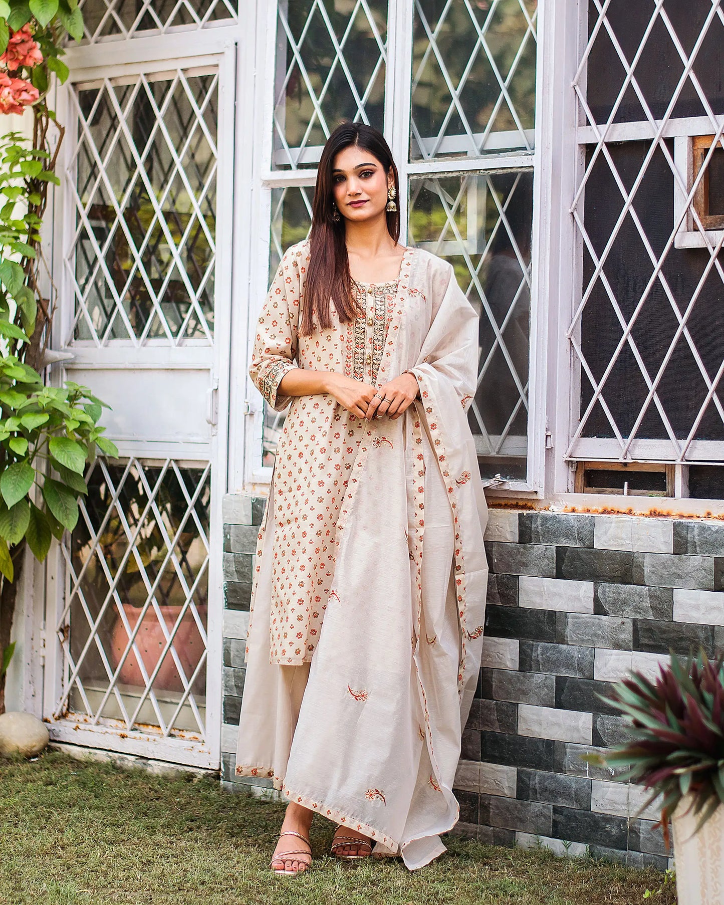 Another alternate front view (full suit, top to bottom): Another perspective of the beige printed chanderi kurta, plain beige palazzo, and coordinating dupatta.