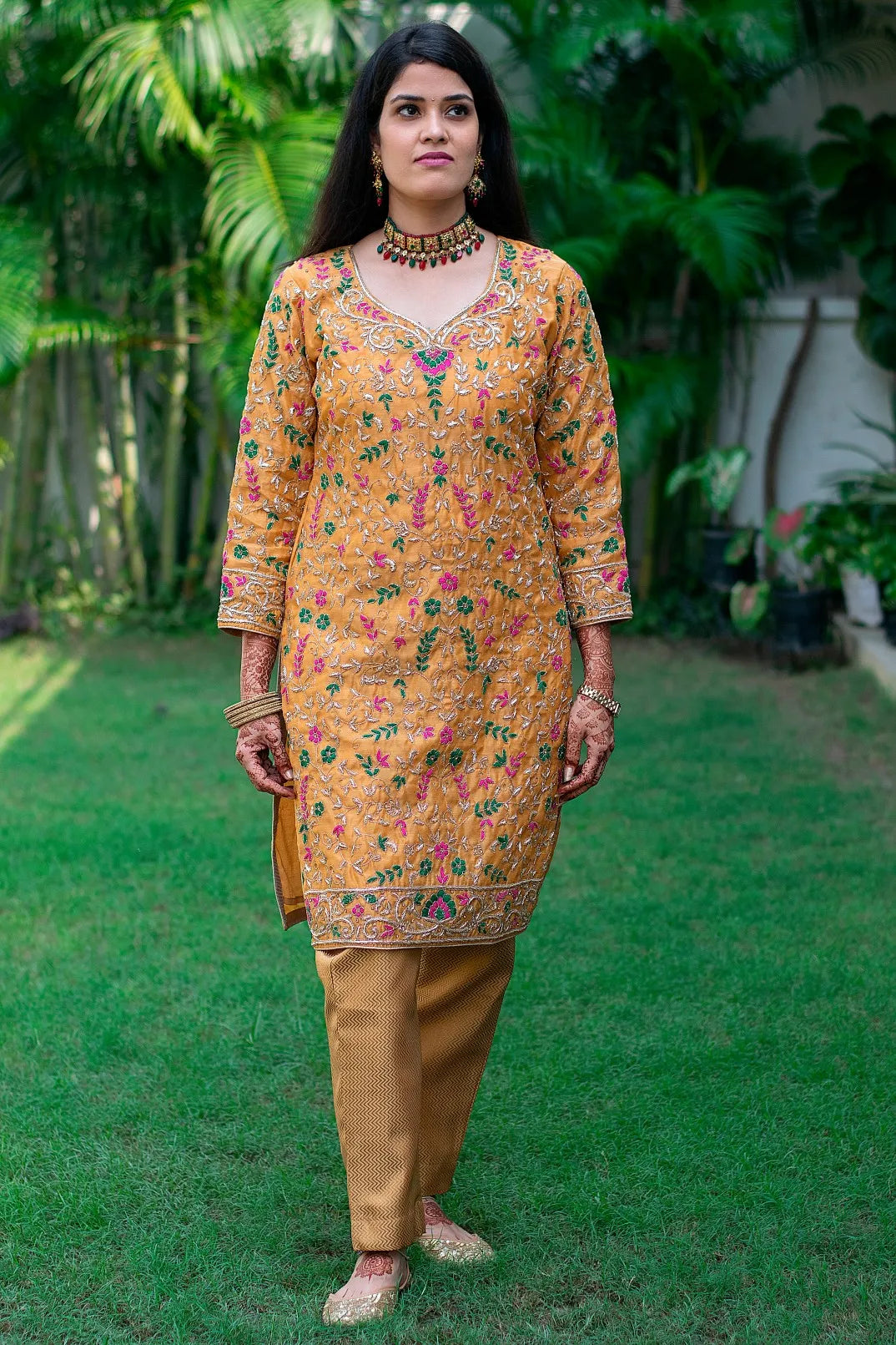 Mustard Chanderi Kurta And Dupatta With Brocade Trousers worn by a woman.