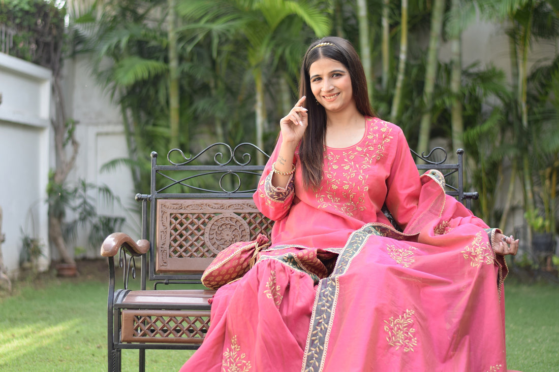 Indian Women wearing hand embroidered chanderi silk kurta set