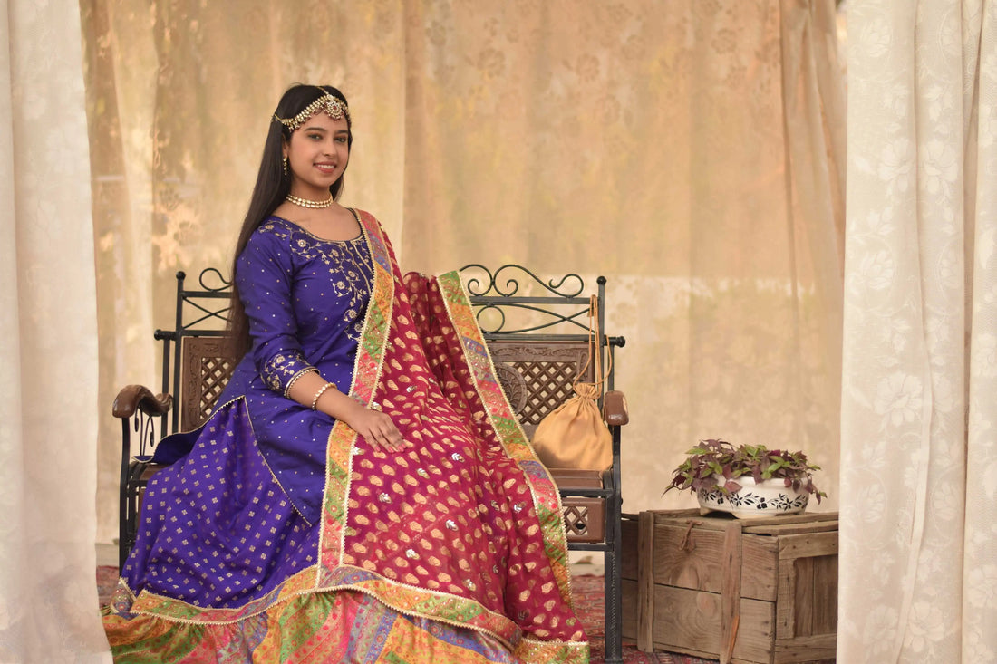 Indian girl sitting in traditional dress - The Indian Couture