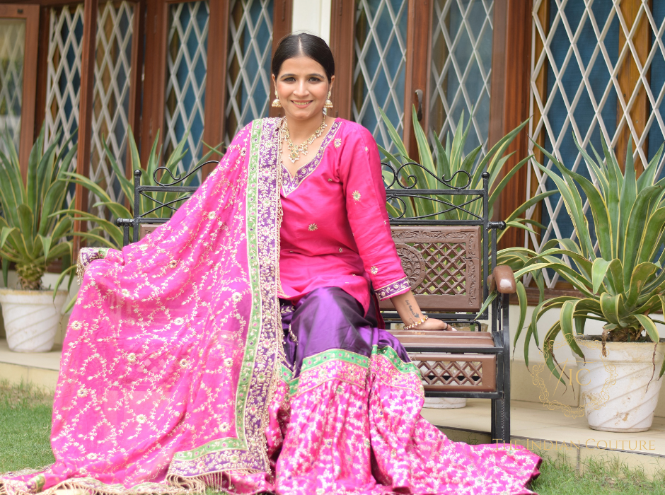 Women wearing hand-embroidered farshi ghararas