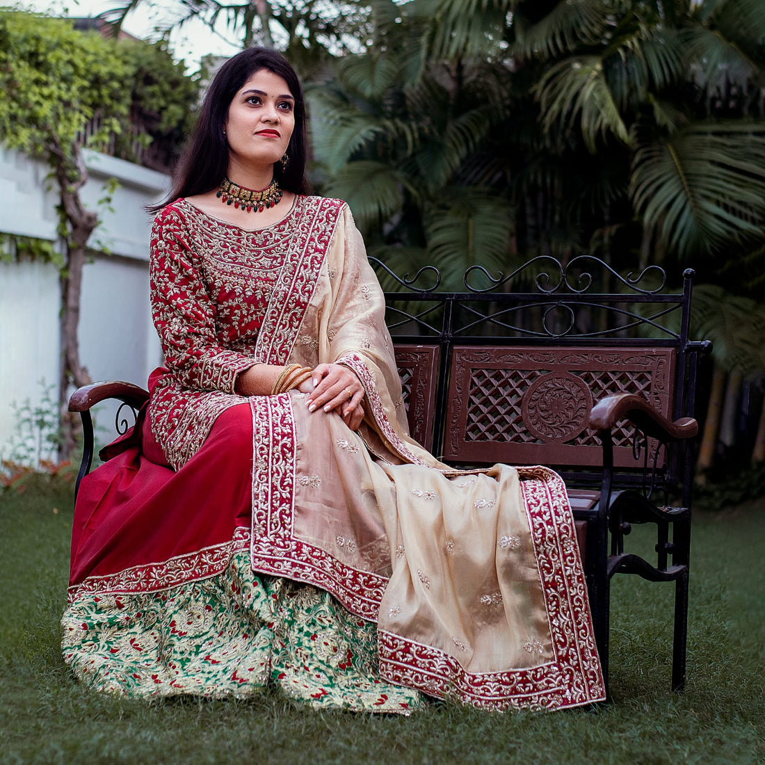 Women wearing hand-embroidered farshi ghararas
