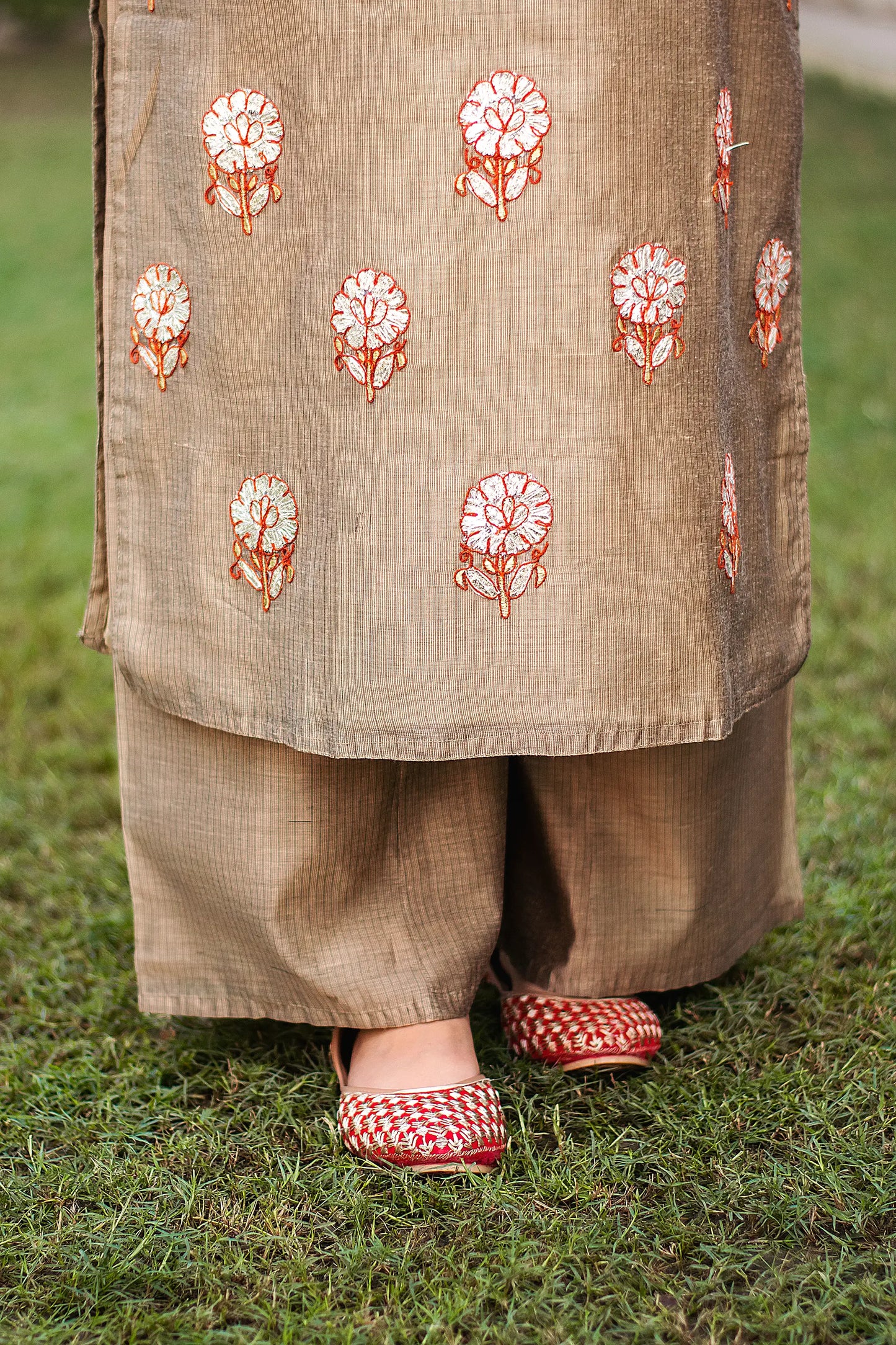 Close-up of the beige Chanderi palazzo worn by the model.