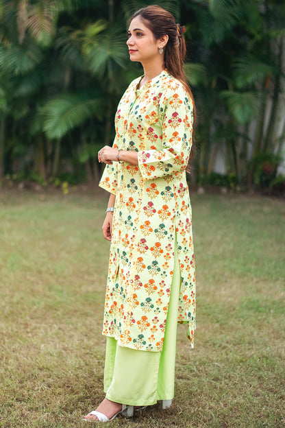 Tea green printed linen kalidar kurta with applique work, green linen dupatta and green palazzo