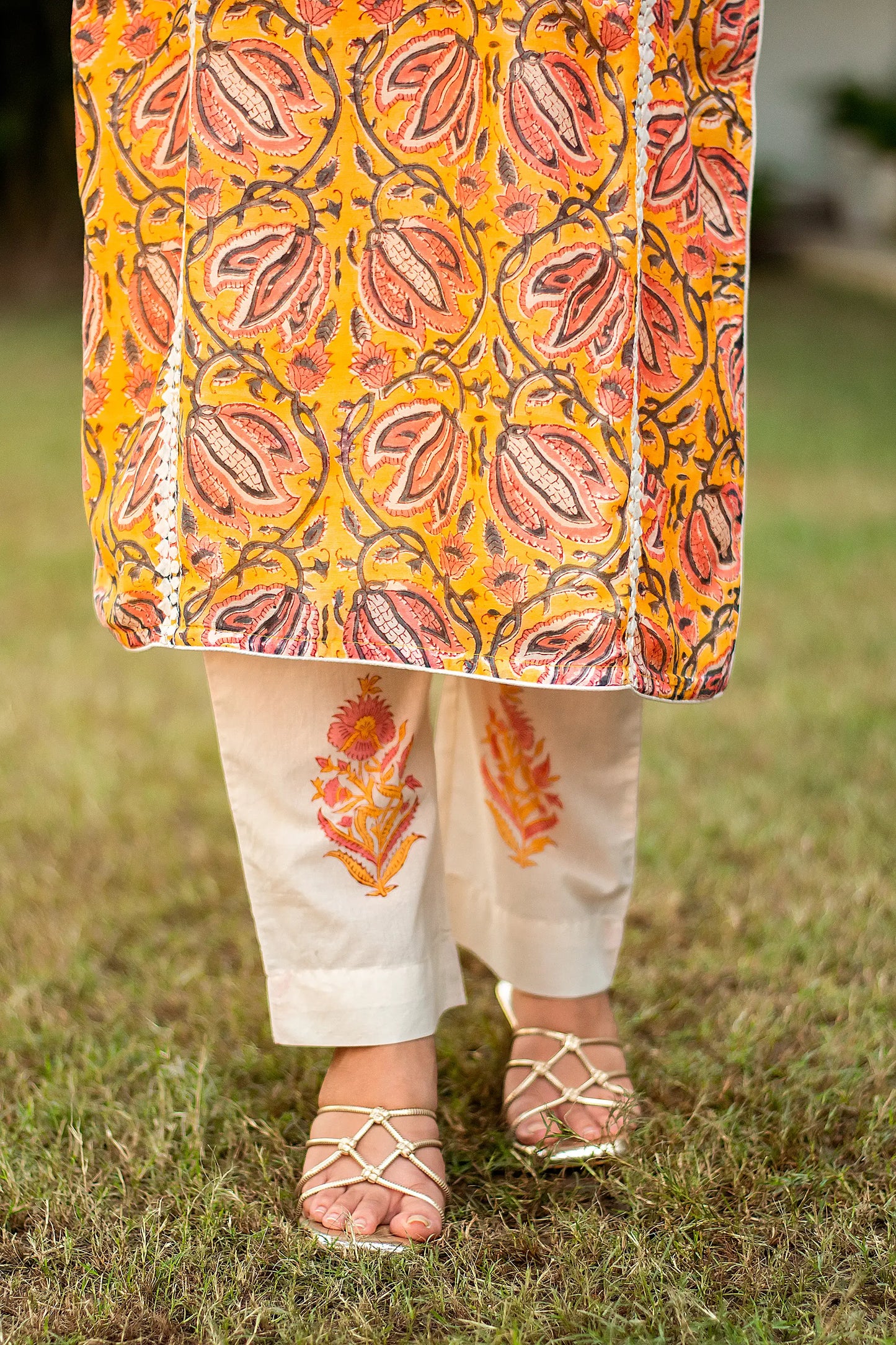 Yellow kalamkari print maheshwari applique work kalidar kurta with off white maheshwari dupatta and trousers