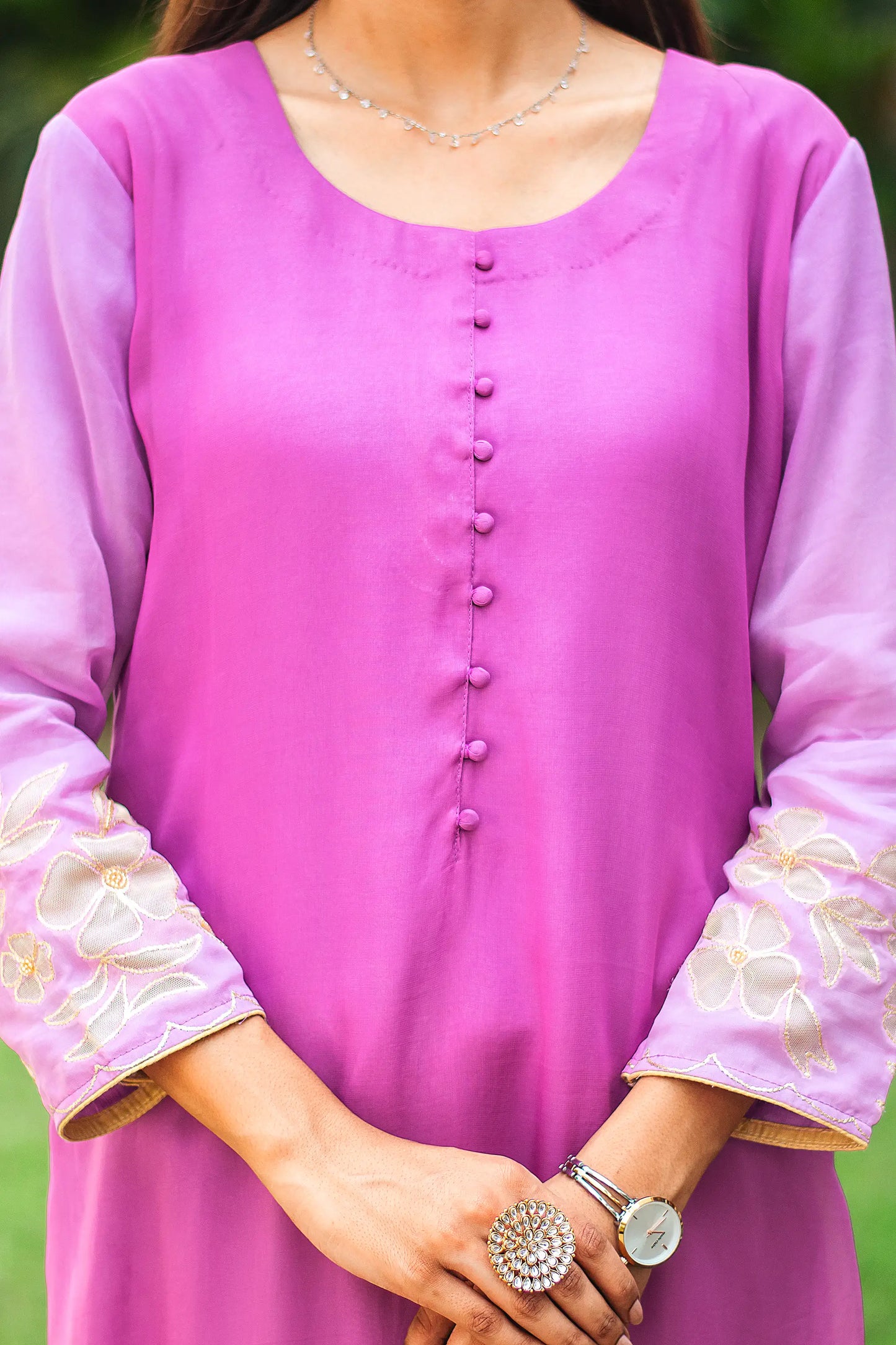 Close-up of  the yoke of a light purple organza kurta.