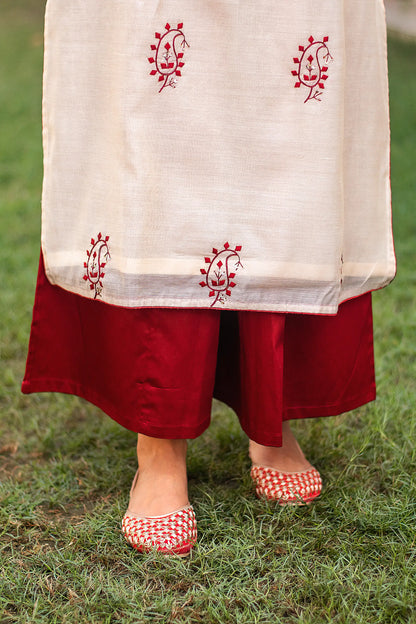 Close-up of the maroon glazed cotton palazzo paired with the beige chanderi kurta.