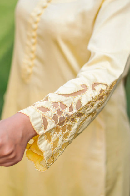 Pastel yellow russian silk kurta & trousers, peach chanderi dupatta with cutwork