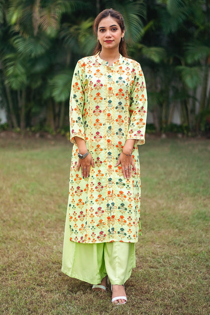 Tea green printed linen kalidar kurta with applique work, green linen dupatta and green palazzo