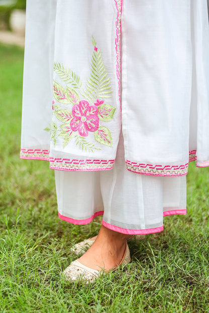 Close-up of the model's white palazzo.