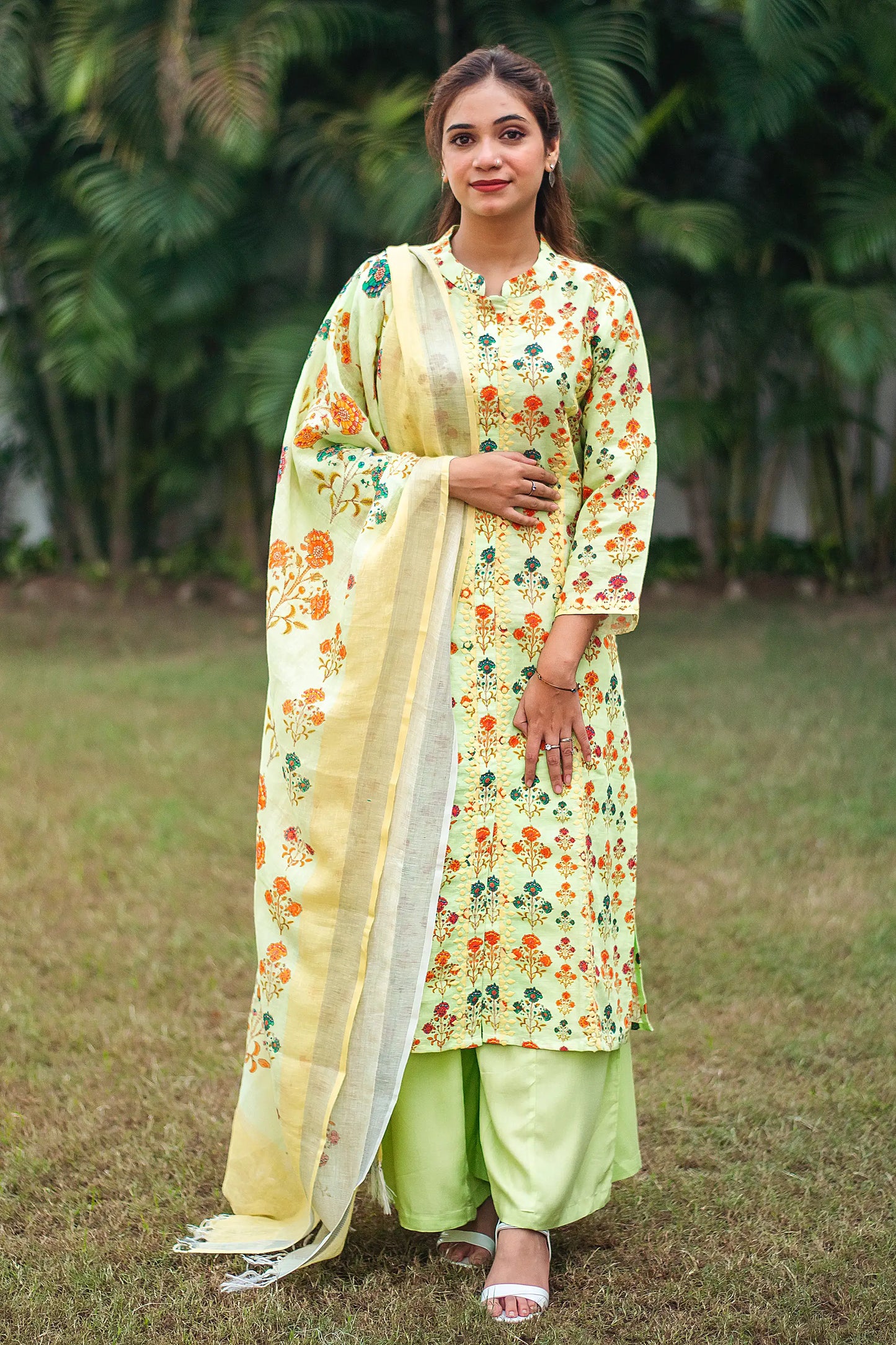 Tea green printed linen kalidar kurta with applique work, green linen dupatta and green palazzo