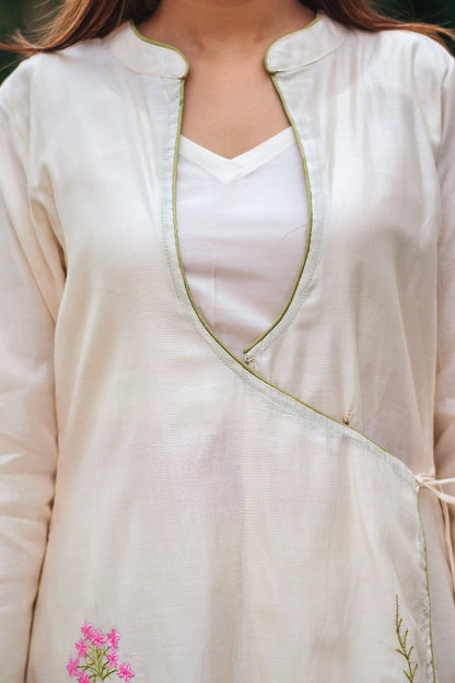 Close-up of the yoke of the off-white angrakha kurta.