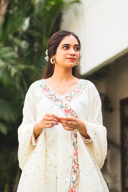 An Indian girl posing in off-white colored Cotton Angarkha