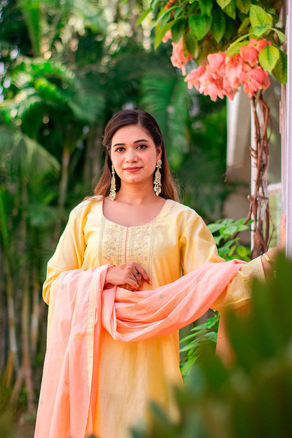 Yellow chanderi kurta, peach chanderi dupatta & yellow trousers with hand embroidery