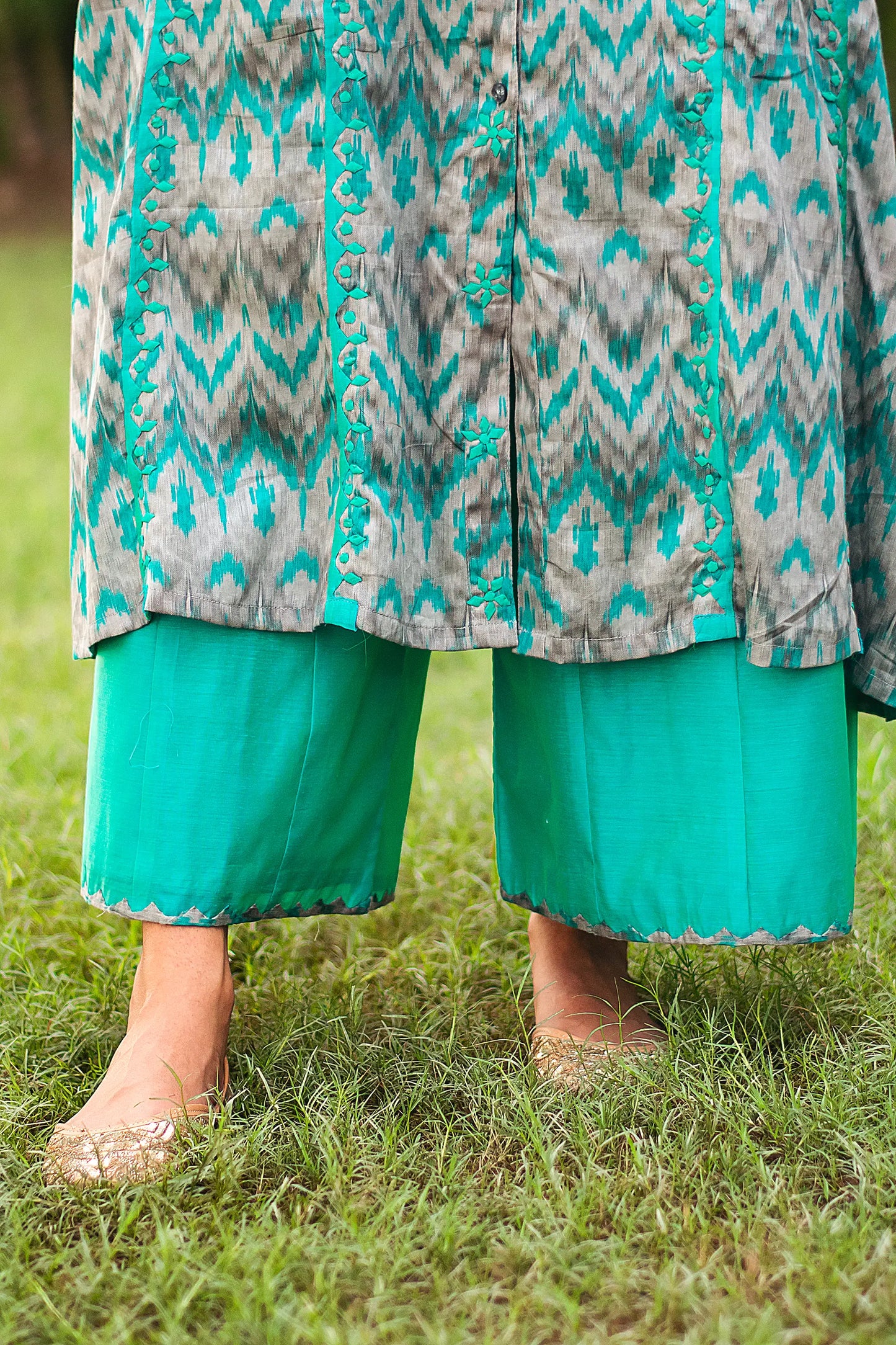 Close-up of the green chanderi palazzo paired with the grey and green ikat print kurta.