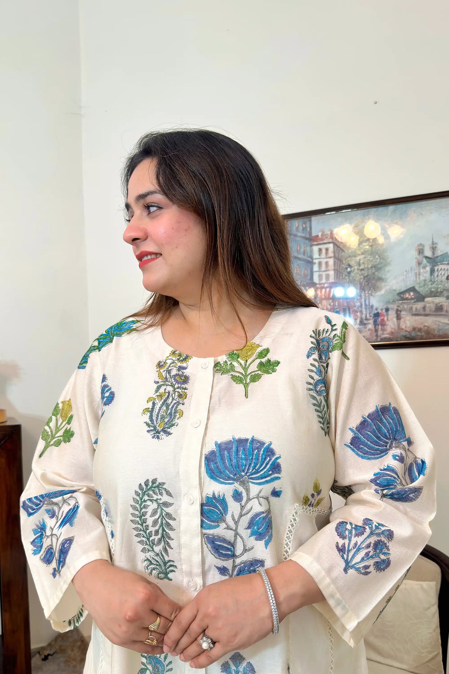 Off-white chanderi A-line kurta and dupatta with blue-green floral hand embroidery and off-white trousers