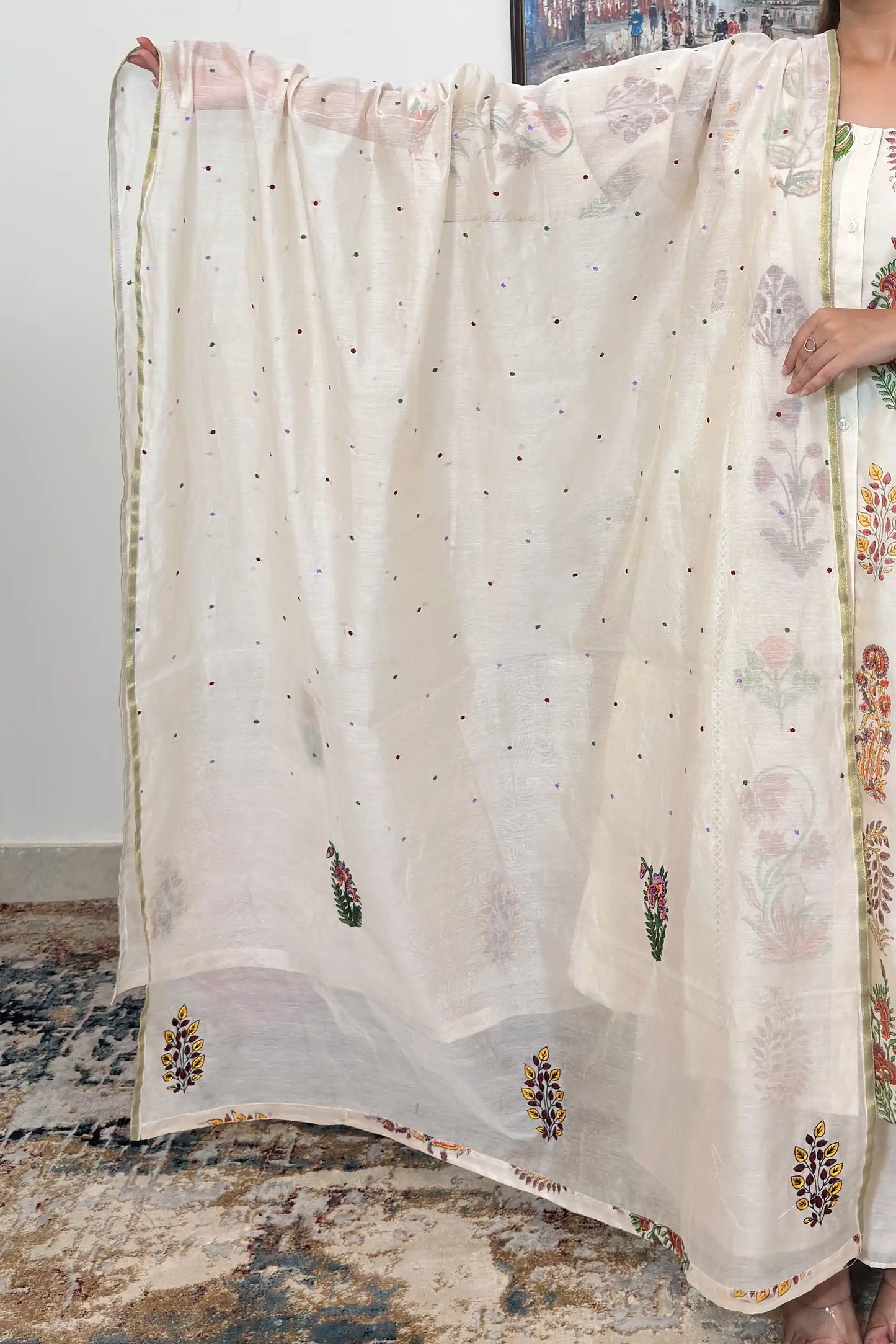 Off-white chanderi A-line kurta and dupatta with multicolour floral hand embroidery and off-white palazzo