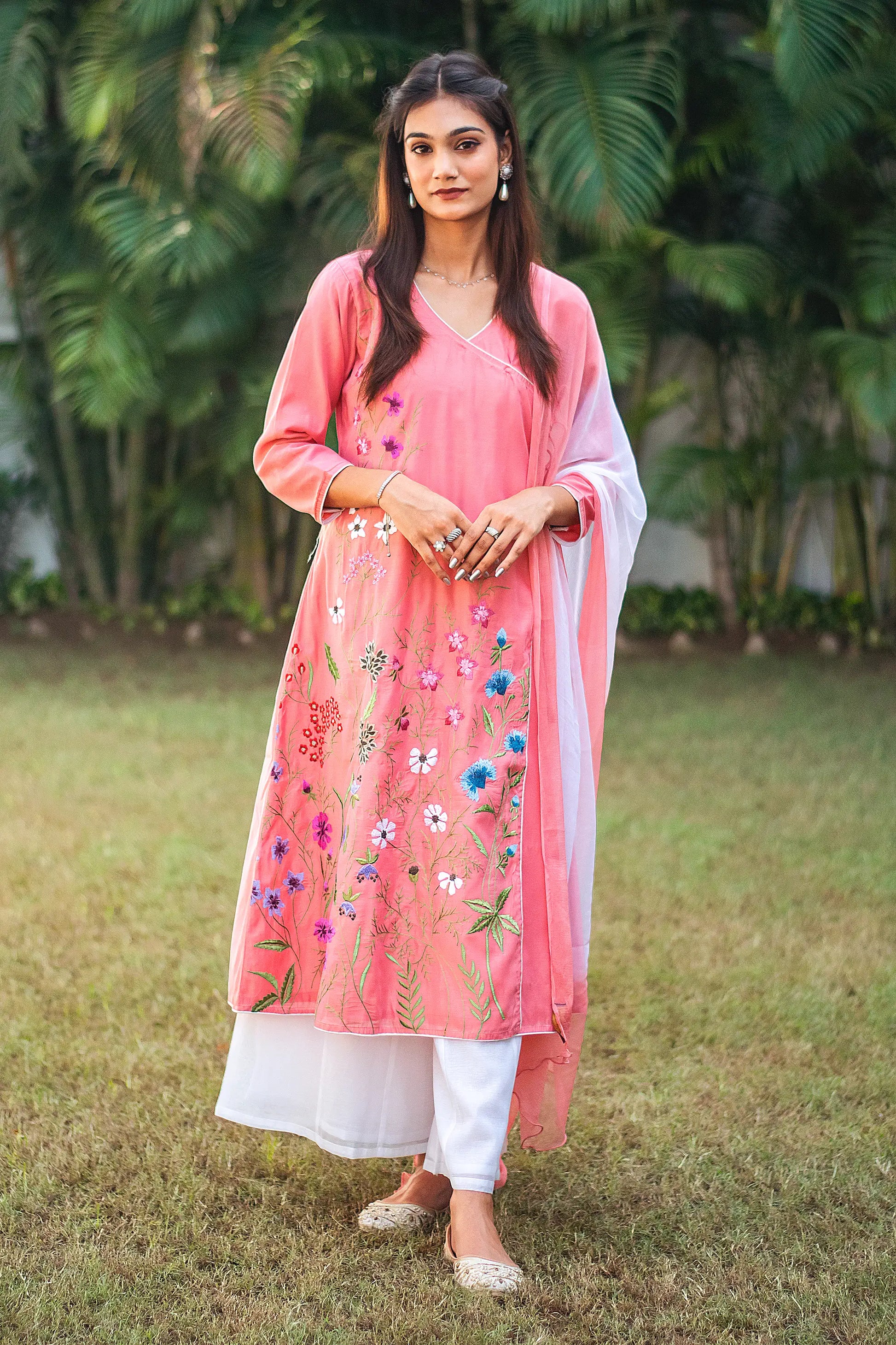 Model wearing the pink chanderi kurta set in an elegant pose, showcasing the ensemble's style.