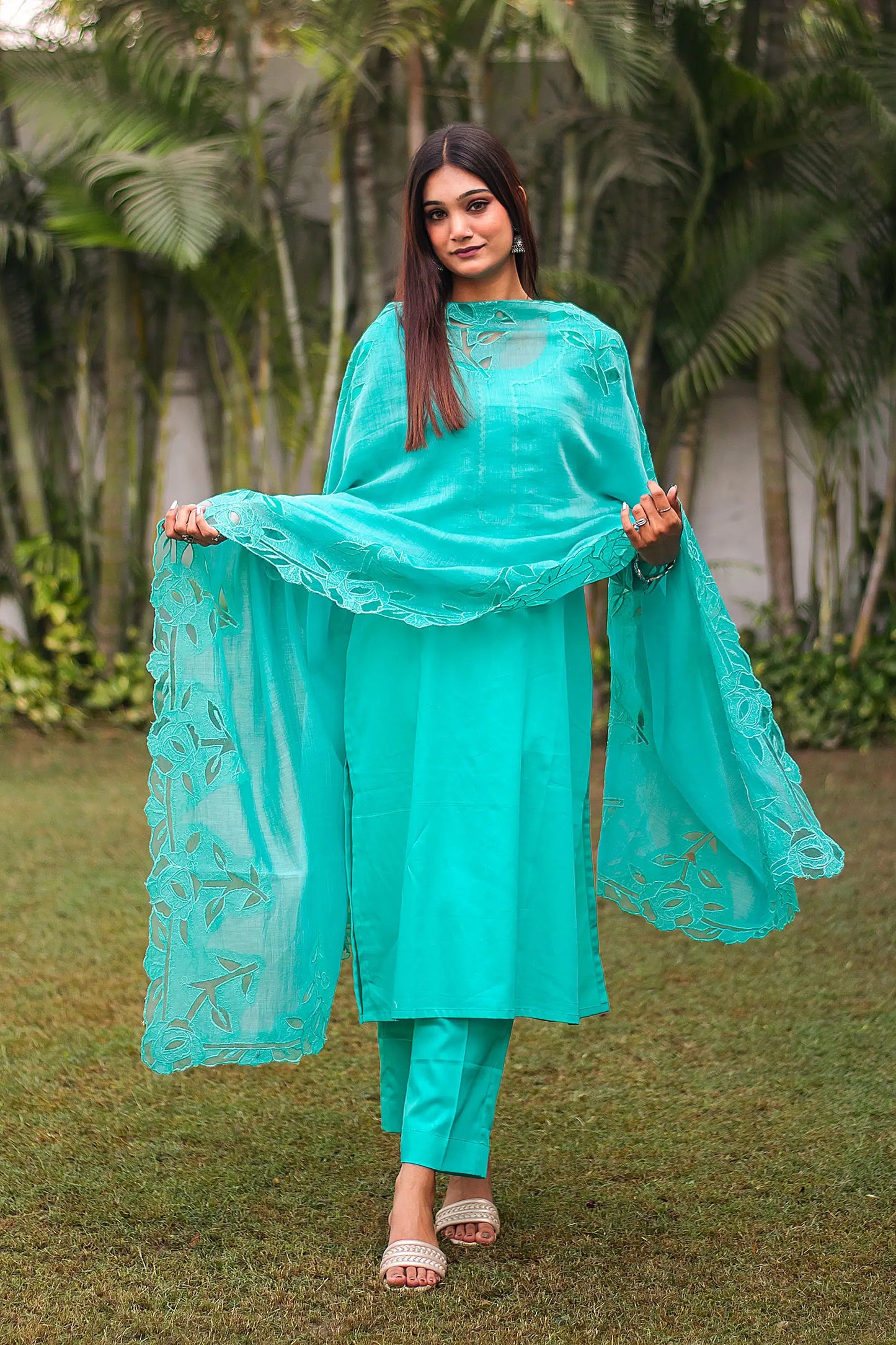 Turquoise green Russian silk kurta & trousers, turquoise green chanderi dupatta with cutwork.