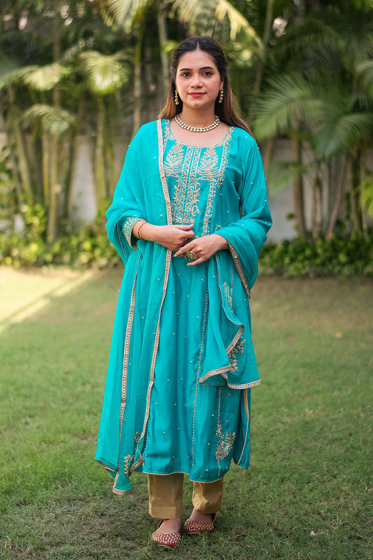 Blue silk kurta, blue chiffon dupatta & golden trousers with zardozi work