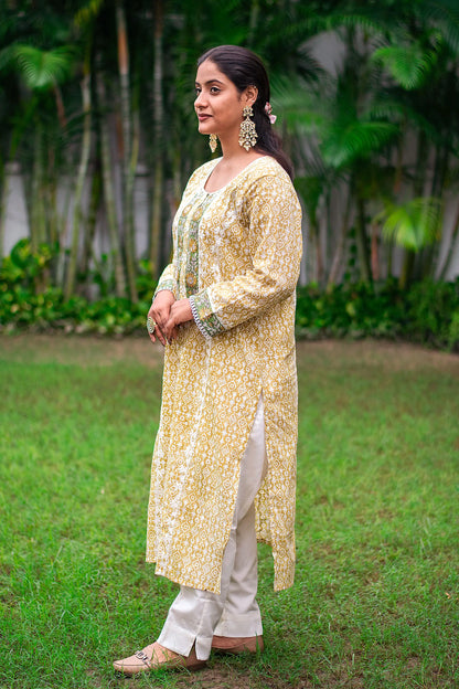 Yellow print linen kurta set with applique work