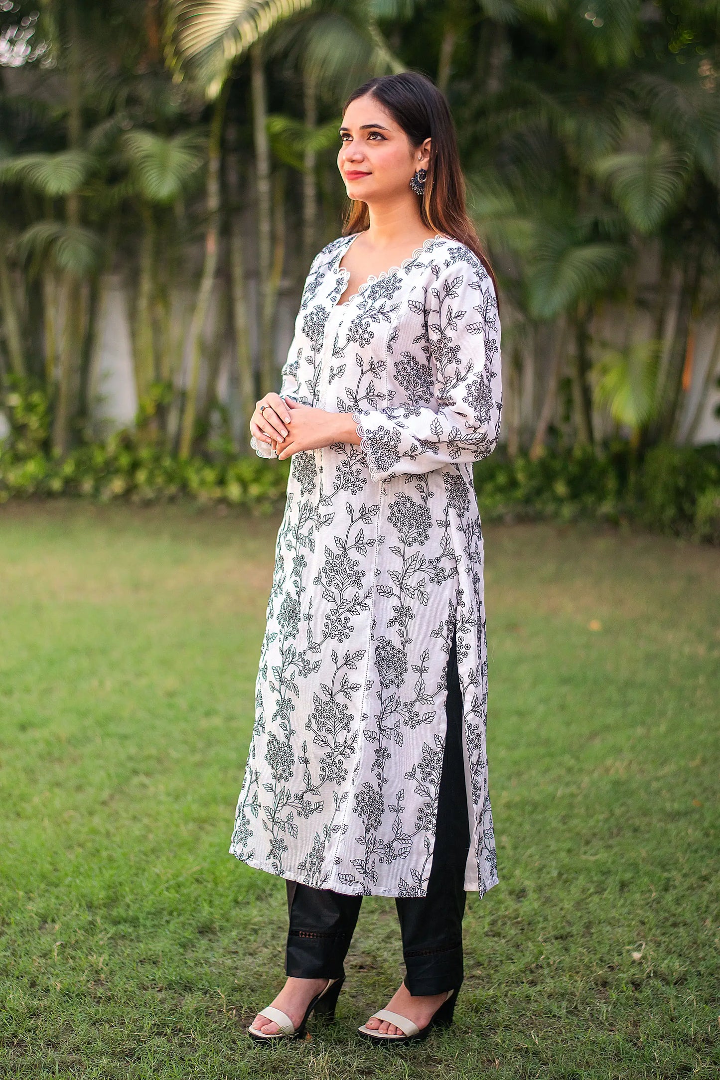 Embroidered white supernet kurta & black supernet dupatta with black trousers