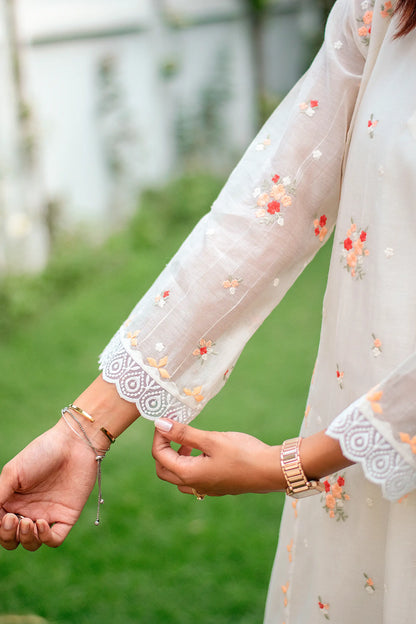 Off-white chanderi kurti, dupatta and trousers with peach-red embroidery & applique work