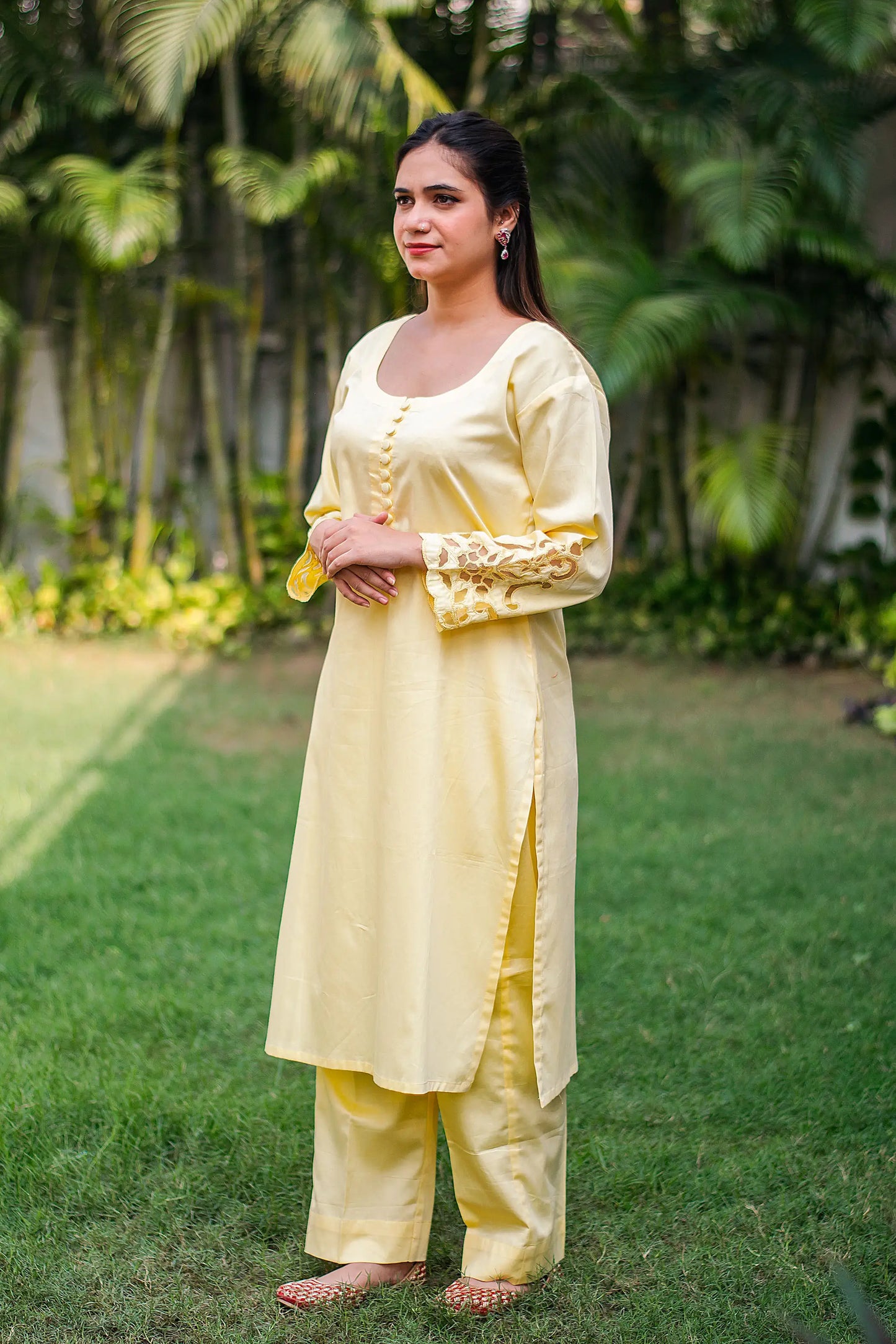 Pastel yellow russian silk kurta & trousers, peach chanderi dupatta with cutwork