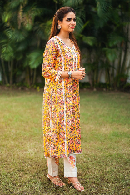 Yellow kalamkari print maheshwari applique work kalidar kurta with off white maheshwari dupatta and trousers