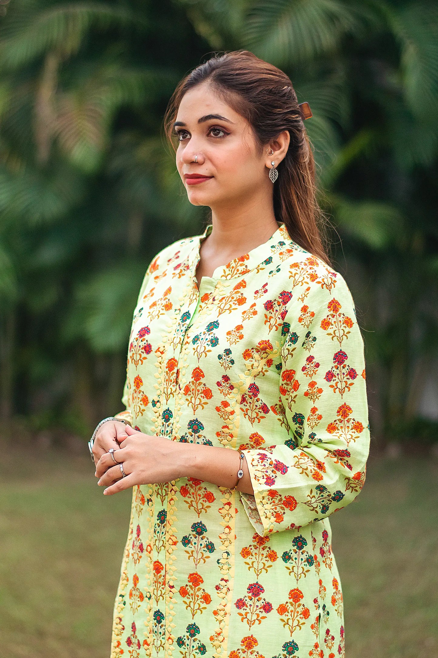 Tea green printed linen kalidar kurta with applique work, green linen dupatta and green palazzo