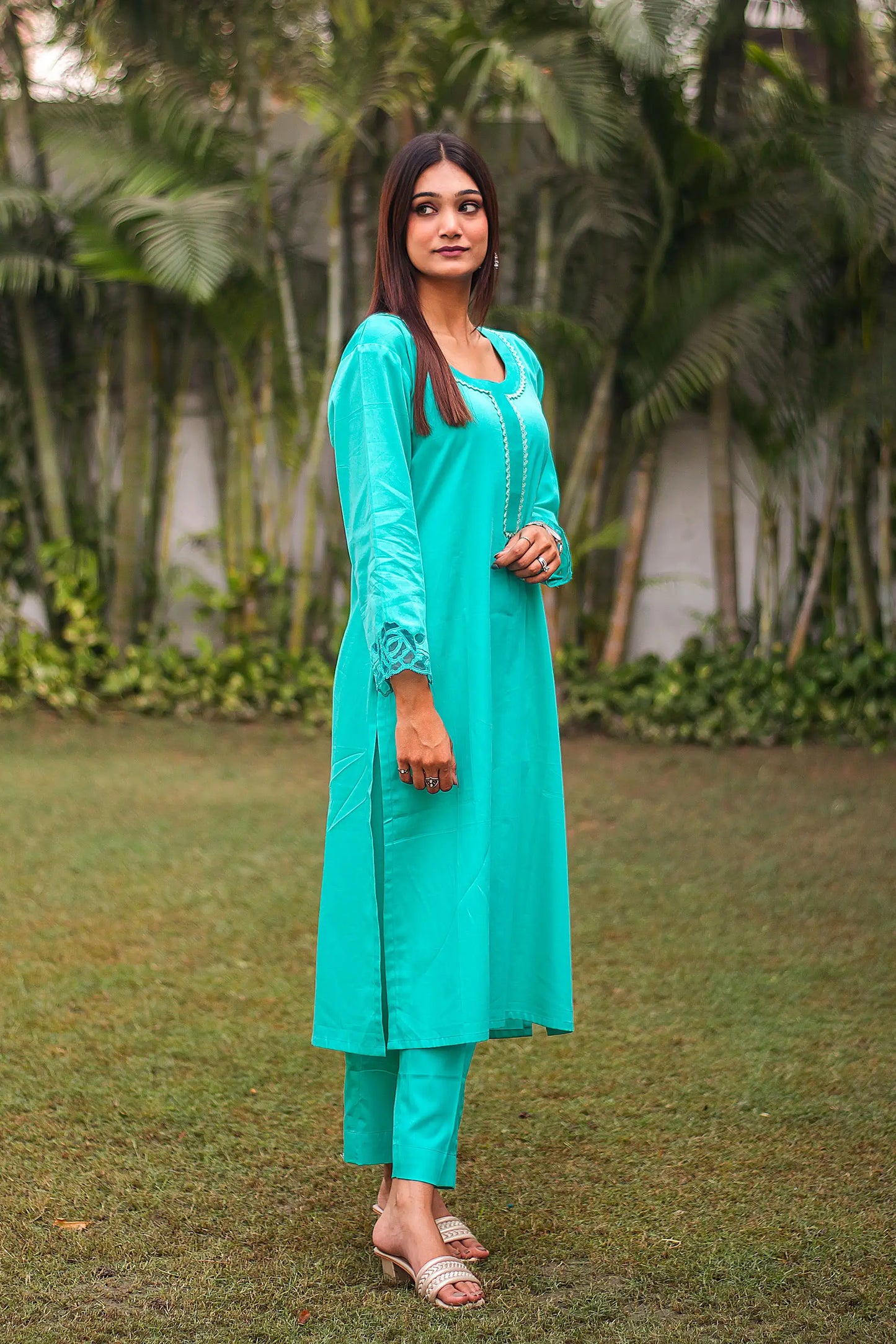 Turquoise green Russian silk kurta & trousers, turquoise green chanderi dupatta with cutwork.