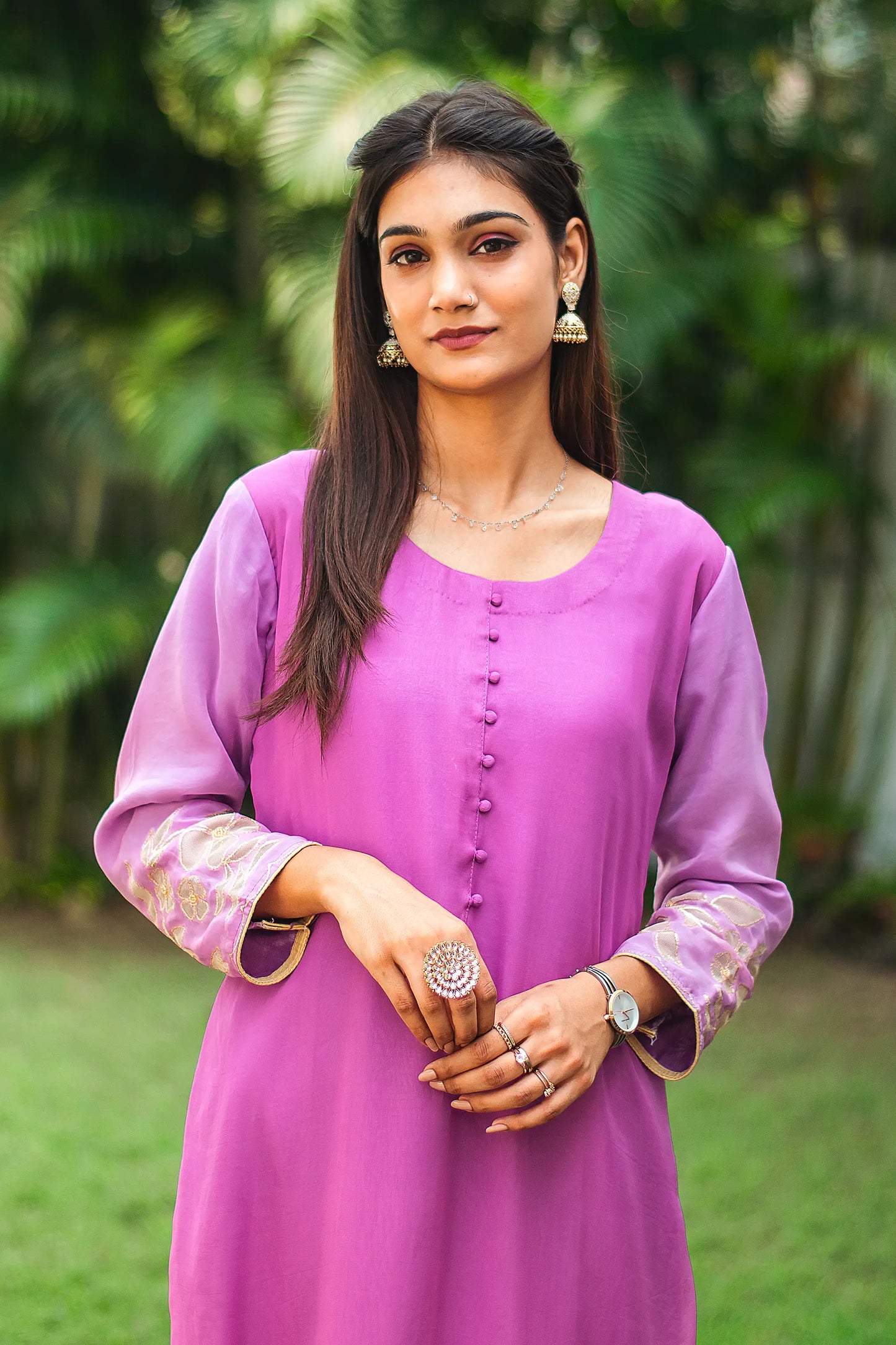 Close-up of an Indian model in a light purple organza kurta.