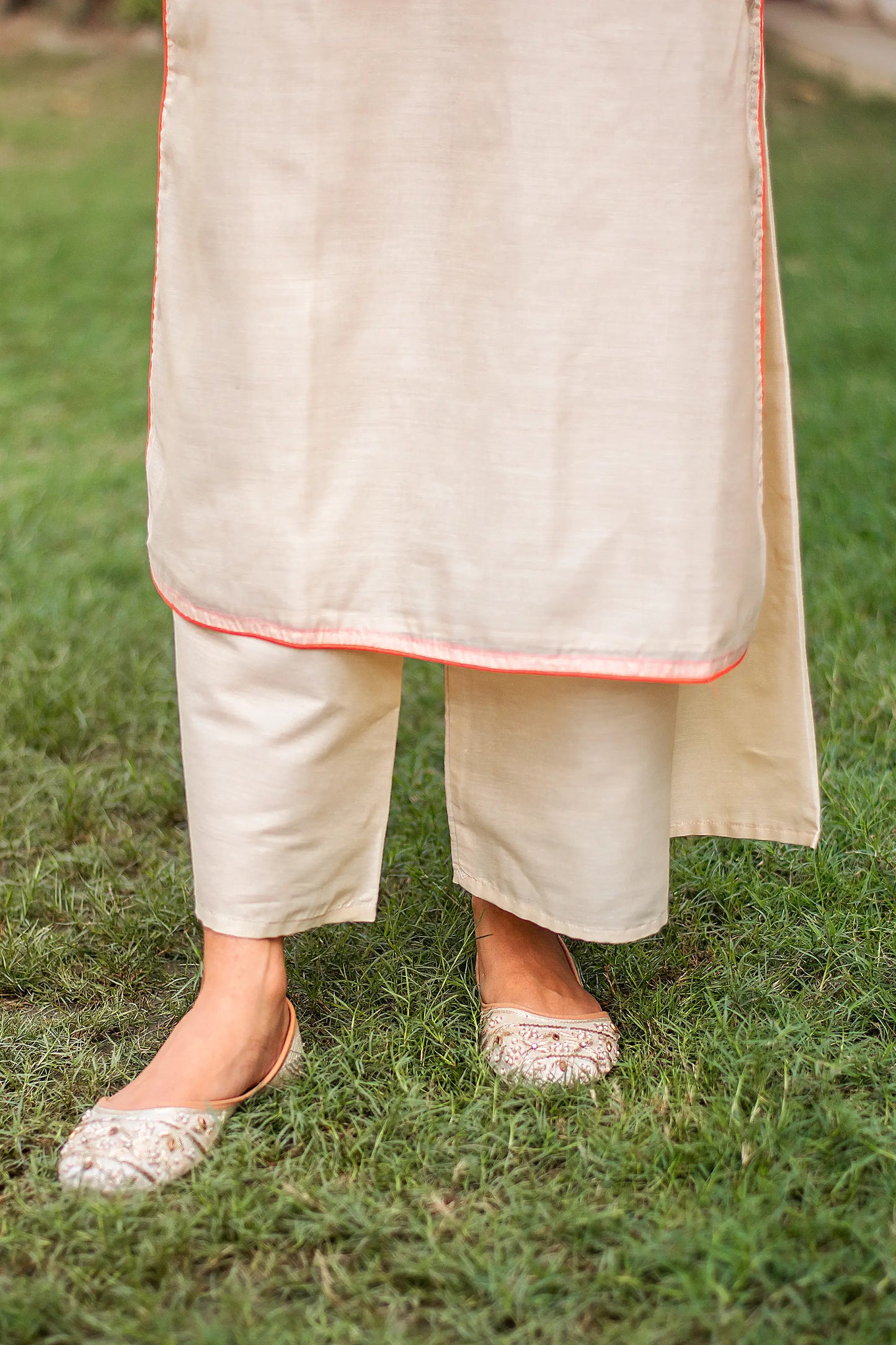 Close-up of the beige palazzo paired with the beige chanderi kurta.