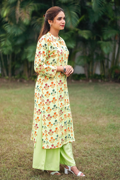 Tea green printed linen kalidar kurta with applique work, green linen dupatta and green palazzo