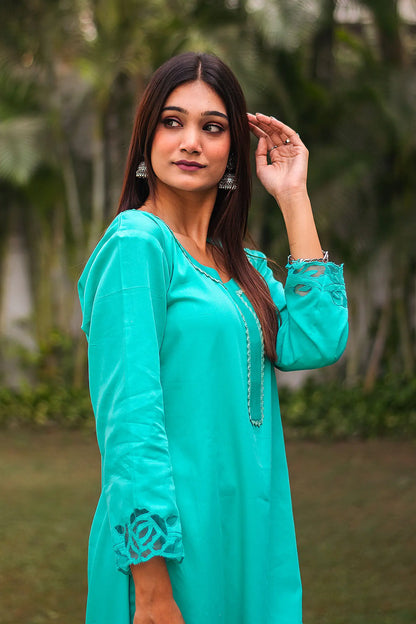 Turquoise green Russian silk kurta & trousers, turquoise green chanderi dupatta with cutwork.