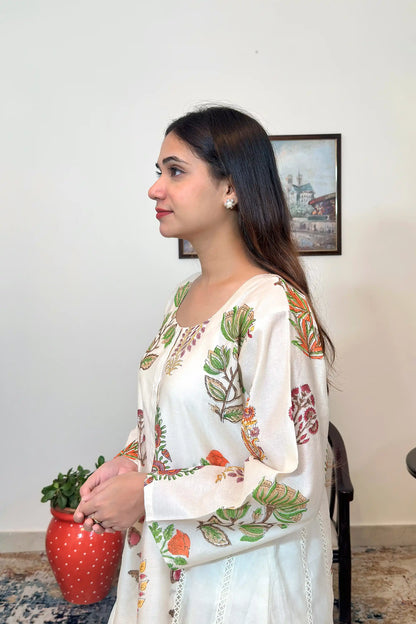 Off-white chanderi A-line kurta and dupatta with multicolour floral hand embroidery and off-white palazzo