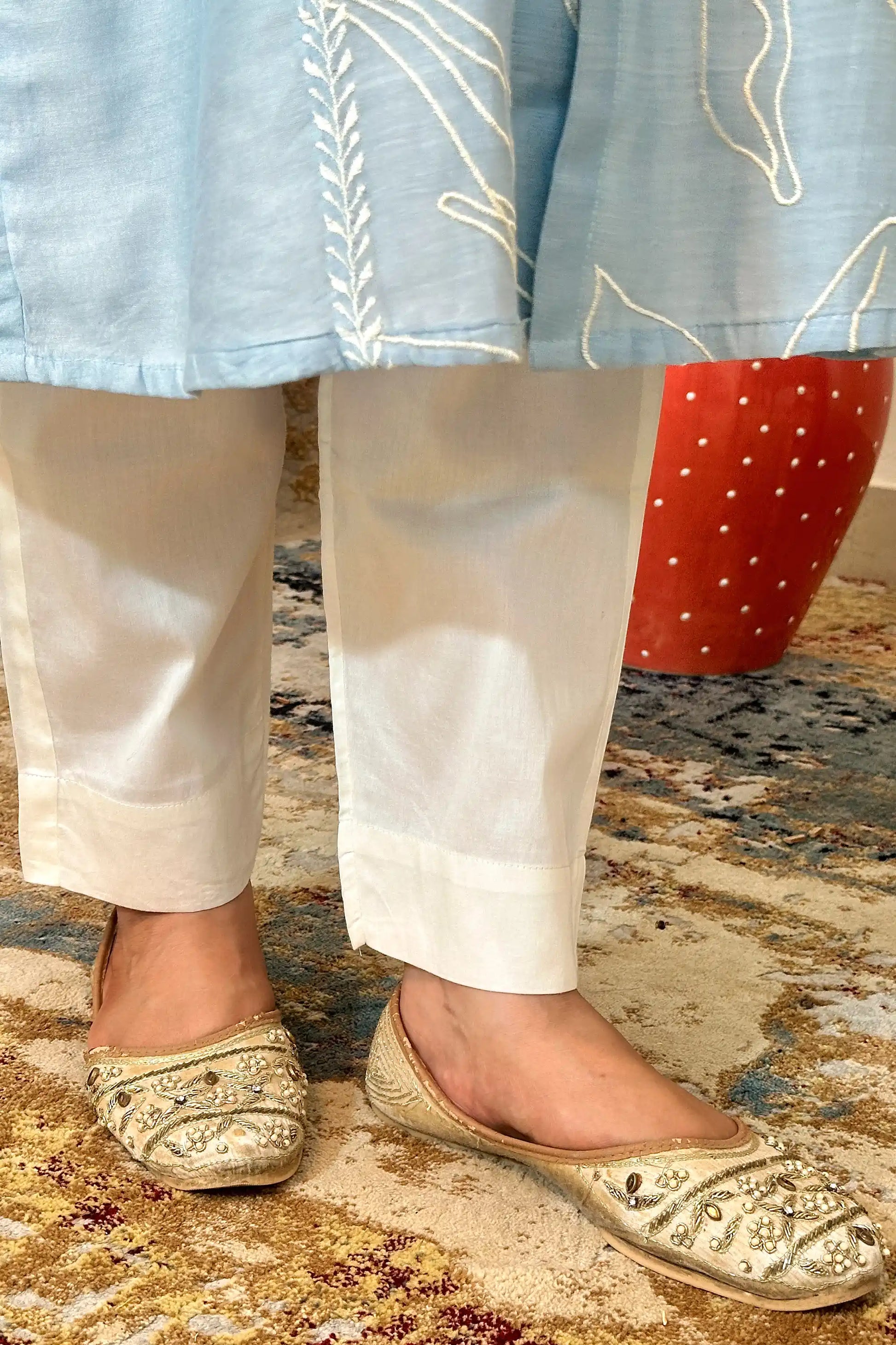 Close-up of the off-white trousers paired with the blue chanderi kurta.