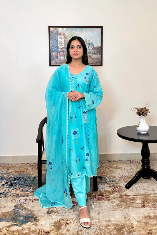 Front view of an aqua-blue chanderi kalidar kurta with dupatta on, featuring blue floral resham embroidery and a button placket, paired with aqua-blue trousers.