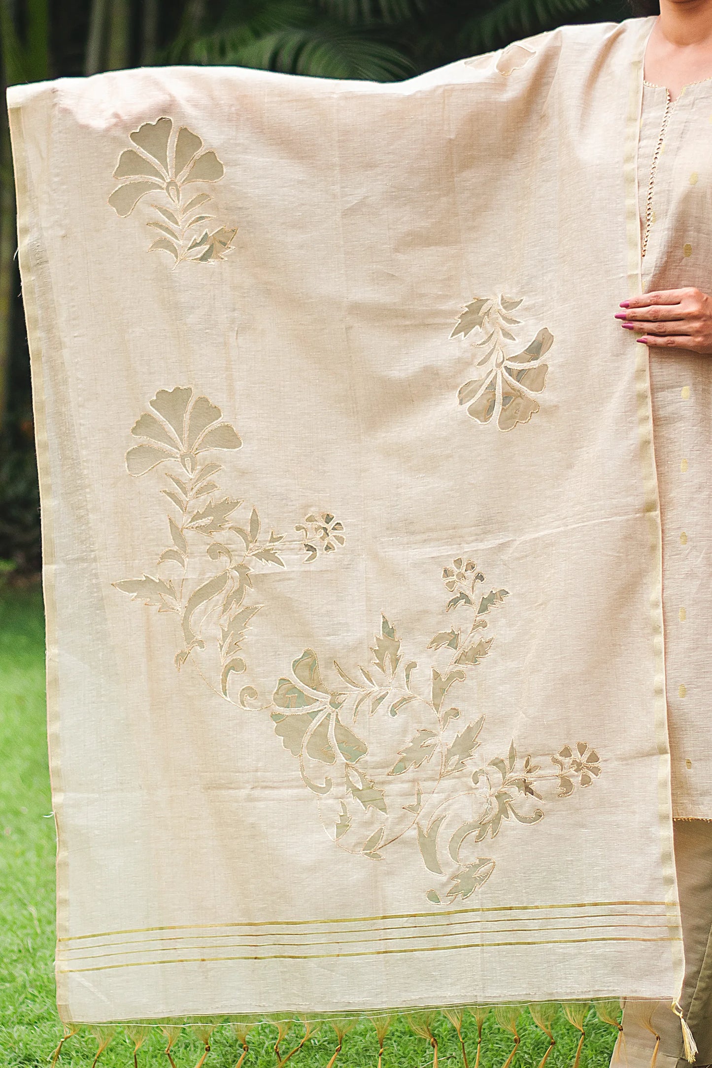 Beige double kali kurta with beige cutwork dupatta and beige trousers