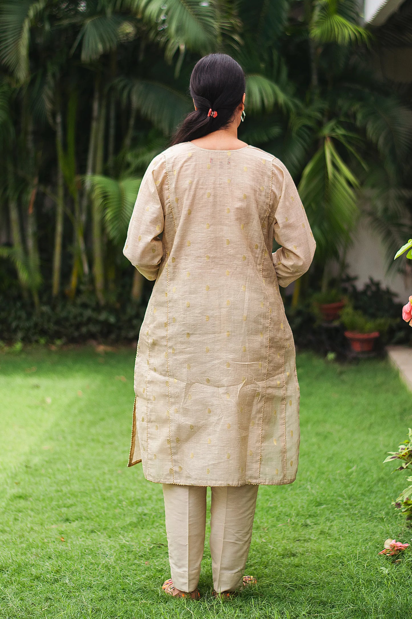 Beige double kali kurta with beige cutwork dupatta and beige trousers