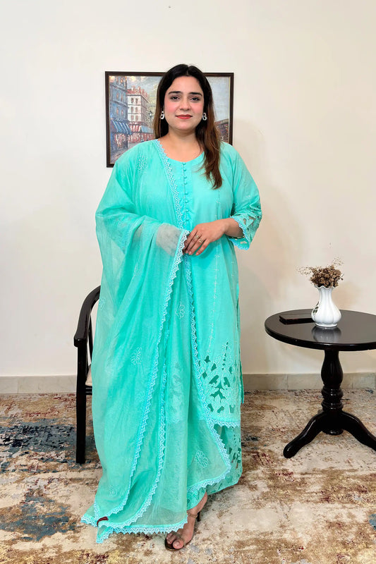 Front view of an aqua-green cotton straight kurta with floral cutwork embroidery, paired with matching aqua-green palazzo and a net dupatta with floral embroidery