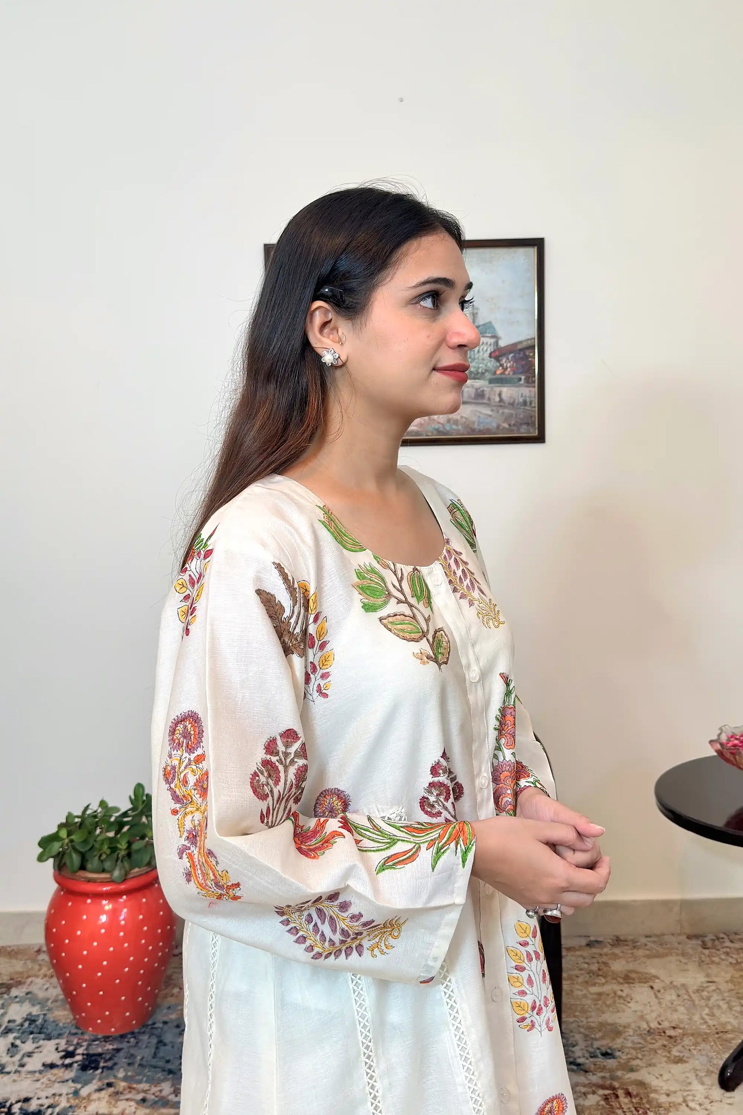 Right side view close-up of an off-white chanderi kurta with multicolour floral print.