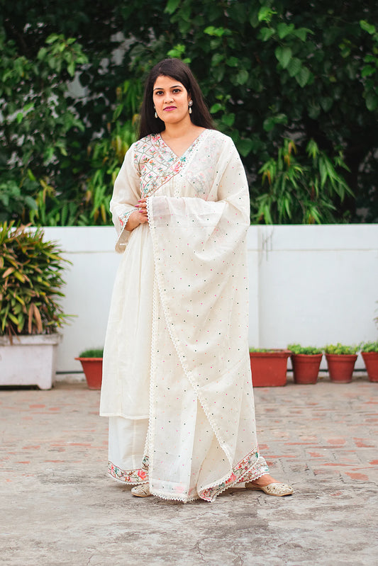 Indian model in an off-white cotton Anarkali kurta and dupatta with Kashmiri embroidery, paired with an off-white palazzo.