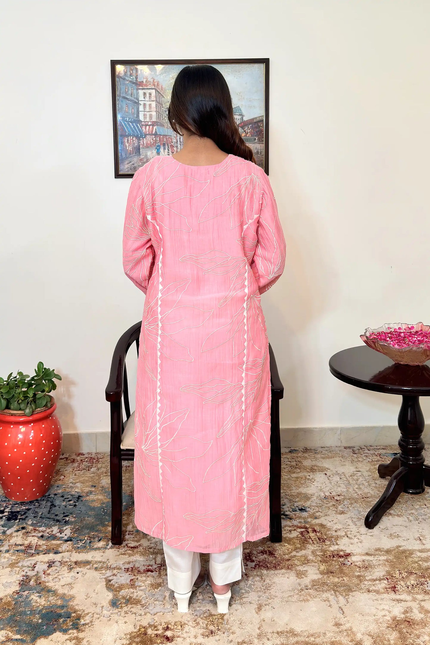 Back view of the pink chanderi kalidar kurta, showing floral resham embroidery across the back panels and the off-white applique border down the centre back seam.