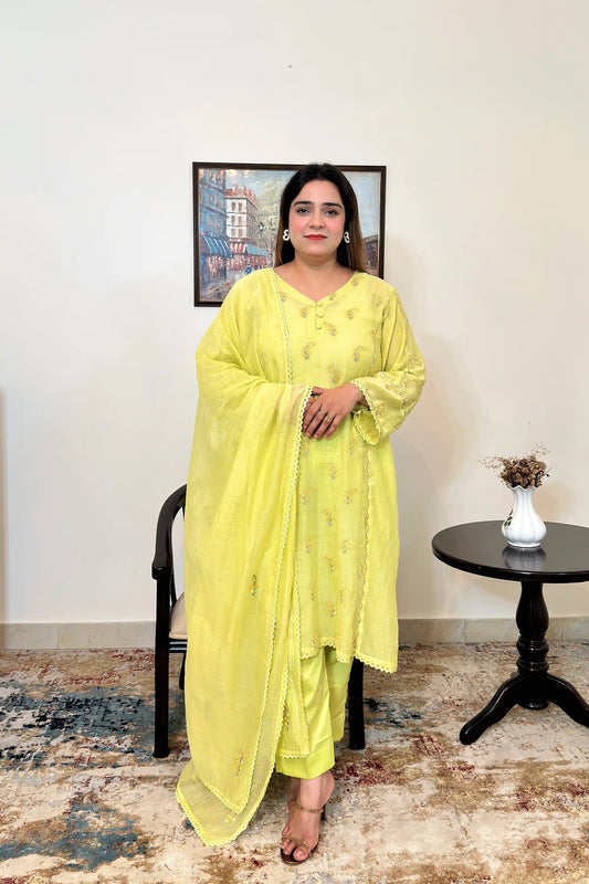 Front view of a lemon-yellow chanderi kalidar kurta with dupatta on, featuring floral resham embroidery scattered across the kurta and dupatta, paired with lemon-yellow trousers.