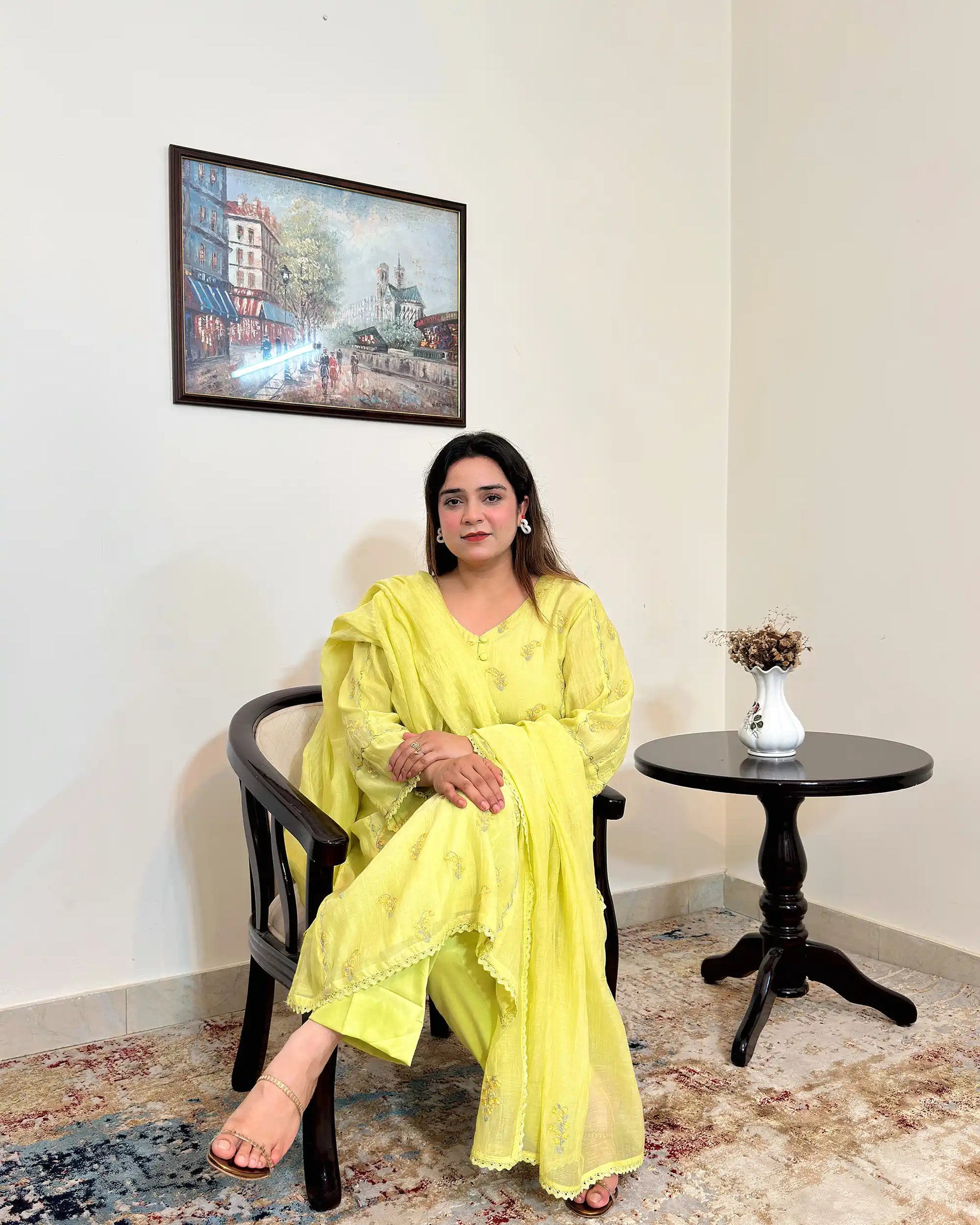 Front view of a lemon-yellow chanderi kalidar kurta with dupatta, showing floral resham embroidery on the kurta and dupatta with matching lemon-yellow trousers.