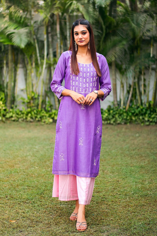 Front view (kurta and palazzo, top to bottom): Model showcasing the purple chanderi kurta with intricate aari embroidery and applique detailing, paired with pale pink palazzo.
