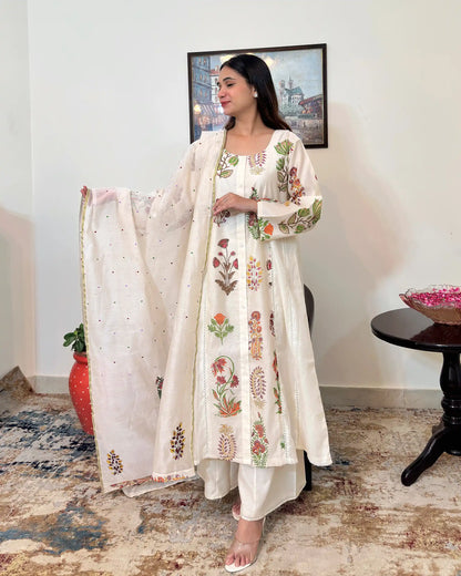 Off-white chanderi A-line kurta and dupatta with multicolour floral hand embroidery and off-white palazzo