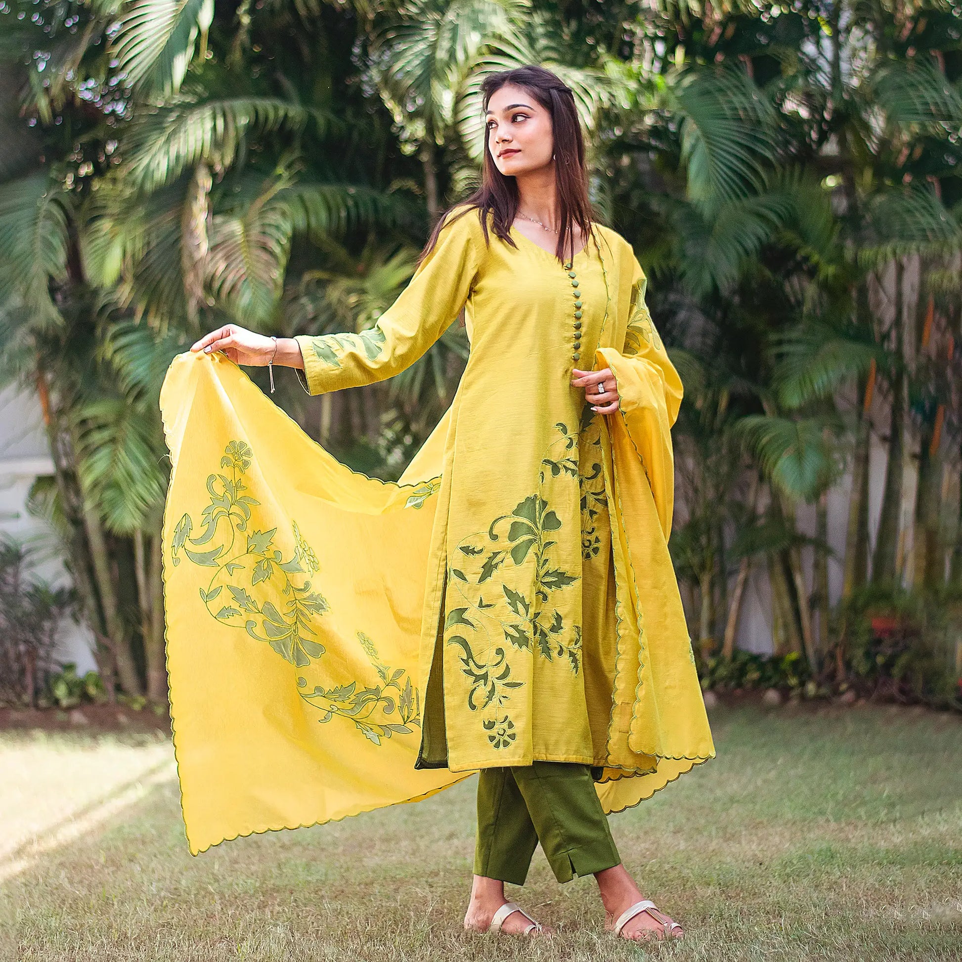 Model wearing the cutwork kurta set in an elegant pose, showcasing the ensemble's style