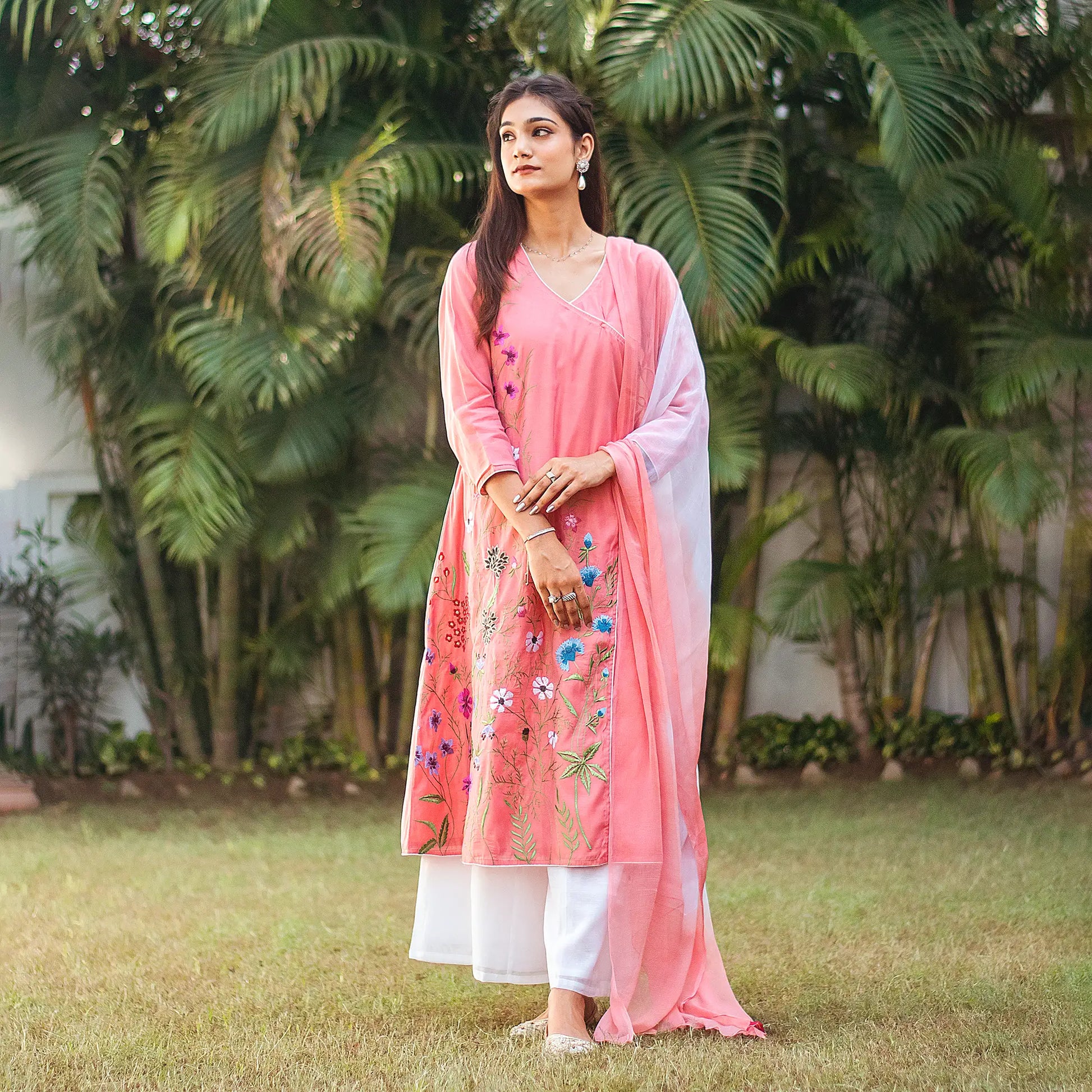 Model wearing the pink chanderi kurta set in another  elegant pose, showcasing the ensemble's style.